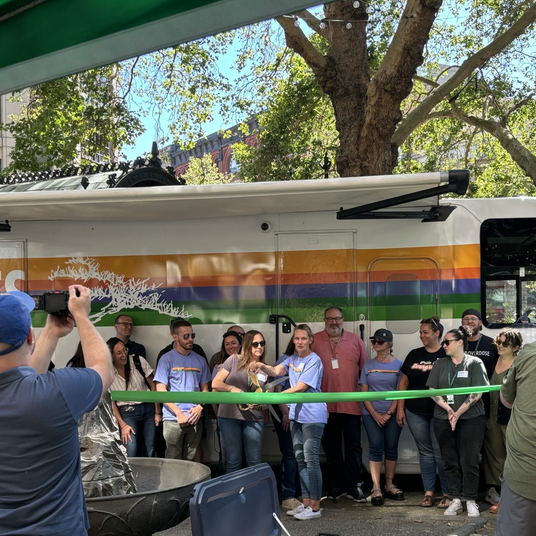 ETS staff cutting ribbon at TIM launch in Pioneer Square